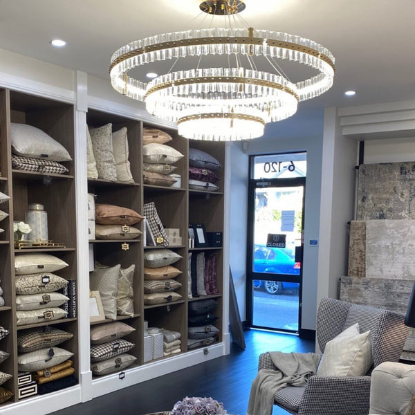 Living space with a statement two-tier crystal ring chandelier